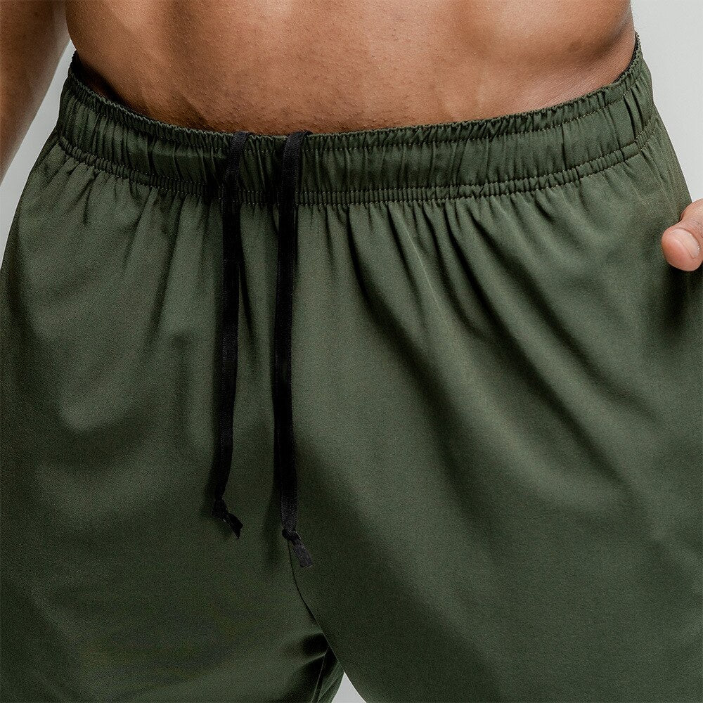 New Fitness Shorts Men Gym Loose Short Pants Running Workout Thin Quick Dry Beach Shorts Male Summer Casual Crossfit Clothing