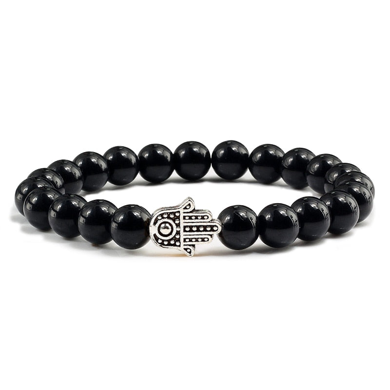 Bracelets en pierre volcanique naturelle pour hommes et femmes, breloques, perles de lave noire mates, bijoux de prière de Yoga, cadeau mignon
Volcanic stone bracelet