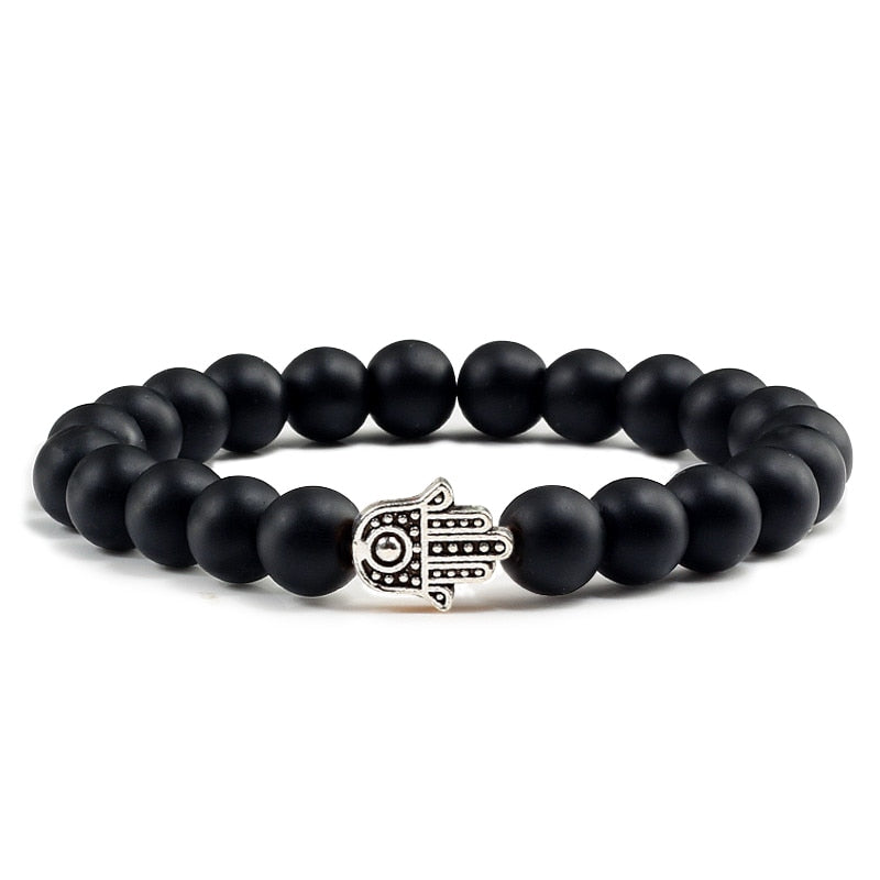 Bracelets en pierre volcanique naturelle pour hommes et femmes, breloques, perles de lave noire mates, bijoux de prière de Yoga, cadeau mignon
Volcanic stone bracelet