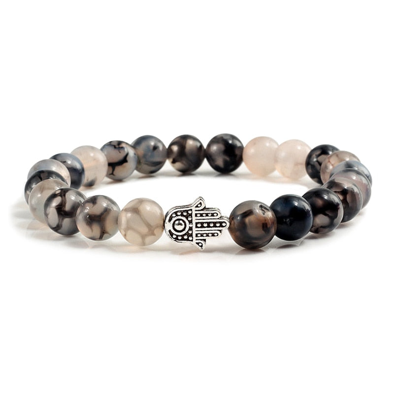 Bracelets en pierre volcanique naturelle pour hommes et femmes, breloques, perles de lave noire mates, bijoux de prière de Yoga, cadeau mignon
Volcanic stone bracelet